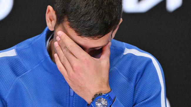 Serbia's Novak Djokovic attends a press conference after losing against Italy's Jannik Sinner in their men's singles semi-final match on day 13 of the Australian Open tennis tournament in Melbourne on January 26, 2024. (Photo by Saeed KHAN / AFP) / -- IMAGE RESTRICTED TO EDITORIAL USE - STRICTLY NO COMMERCIAL USE --