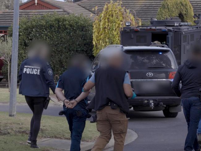 Police raids in connection with Operation Ironside. A raid in Sydenham.