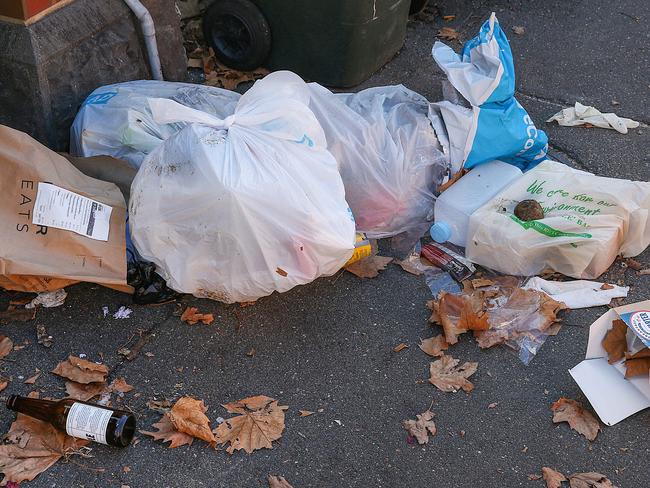 Rubbish outside the North Melbourne house. Picture: Ian Currie