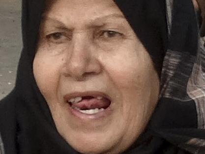 Iraqi security forces help trapped civilians to come out to safe places in Ramadi, 70 miles (115 kilometers) west of Baghdad, Iraq, Thursday, Dec. 31, 2015. Anbar Provincial Council head Sabah Karhout told The Associated Press on Thursday that sporadic clashes and airstrikes were taking place in areas that are still under IS control. He says a major offensive to clear the remainder of the provincial capital is on hold due to the bad weather, he says families are still trapped in the IS-held areas of the city, where they are being used as human shields. (AP Photo)