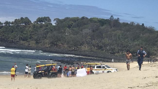 Police on the beach at Fingal Head after Dylan Carpenter, 20, was pulled from the water. Picture: Phoebe Moore/ Nine News