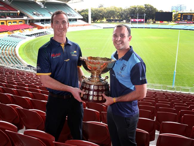 Eagles captain Patrick Giuffreda and Sturt captain Zane Kirkwood with the SANFL Premiership trophy. Picture: Dean Martin.