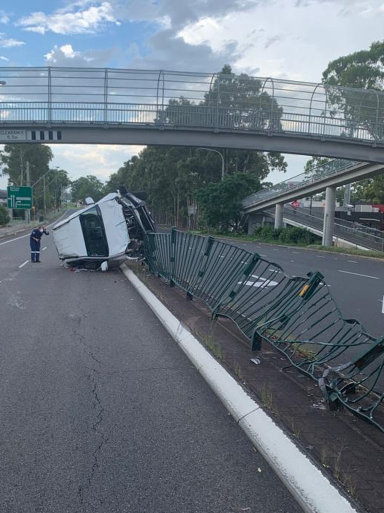 A young man faces a slew of charges after he lost control of his car and left it impaled on a fence in Sydney. Picture: NSW Police