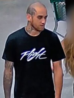 Queensland Police have released CCTV footage of a man who is alleged to have assaulted a teenage boy in the isles of Plainland Woolworths on February 18.