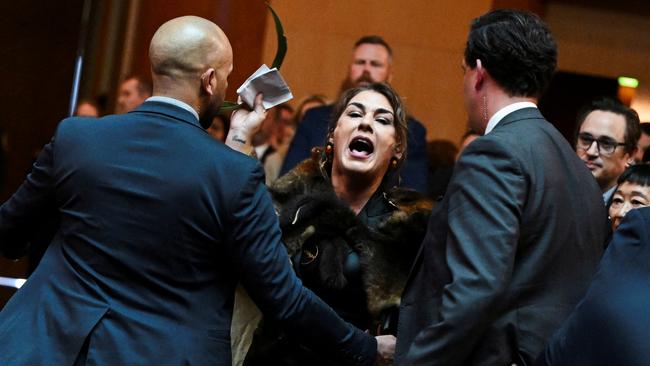 Indigenous senator Lidia Thorpe stages a protest as King Charles and Queen Camilla attend a parliamentary reception in Canberra. Picture: Reuters