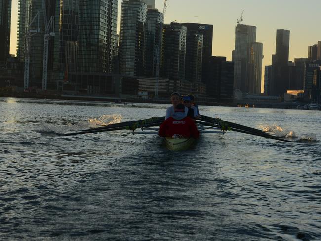 Mercantile rowers hit the Yarra River.