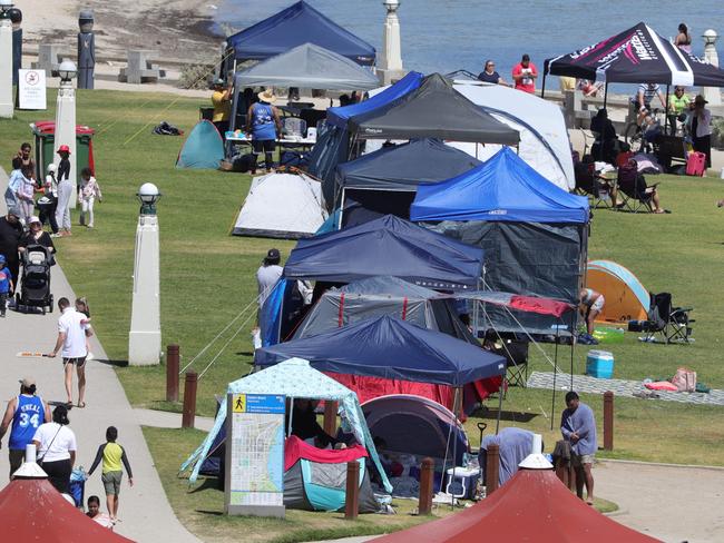 GeelongÃs Eastern Beach on January 1 2025 with people and tents on the foreshore. Picture: Mark Wilson