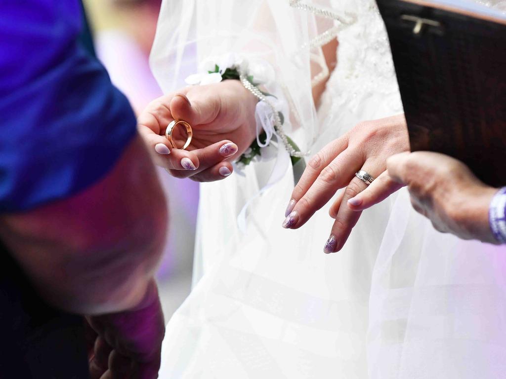 Simone Ward and Geoffrey Borninkhof, were married on The Hill Stage at Gympie Music Muster. Picture: Patrick Woods.