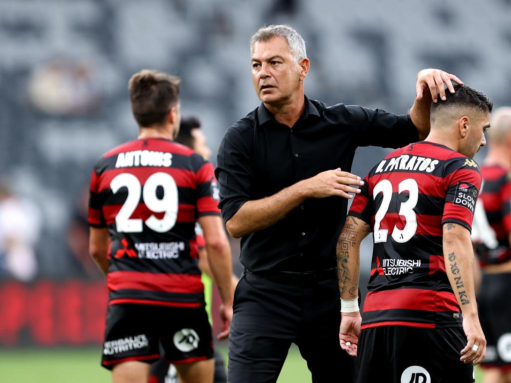 Wanderers coach Mark Rudan consoles his players in defeat. Picture: Brendon Thorne/Getty Images