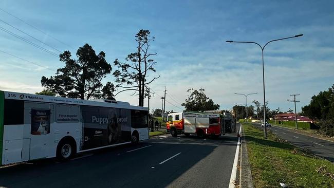 Road closed in Coombabah after power line falls on bus.