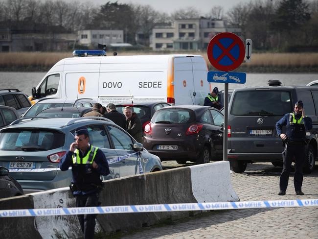 Police officers patrol in Antwerp where Belgian police arrested a man. Picture: AFP/Belga/Virginie Lefour