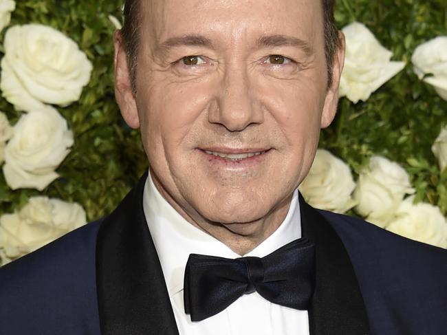 FILE - In this June 11, 2017 file photo, Kevin Spacey arrives at the 71st annual Tony Awards at Radio City Music Hall in New York. The sexual harassment and assault allegations against Harvey Weinstein that rocked Hollywood and sparked a flurry of allegations in other American industries, as well as the political arena, are reaching far beyond U.S. borders. Emboldened by the women, and men, who have spoken up, the "Weinstein Effect" is rippling across the globe. London was for many years a base for actor Spacey, who served as artistic director of the Old Vic theater from 2004 until 2015. The allegations of sexual harassment that have surfaced in recent weeks, including some during his tenure at the Old Vic, have cast a pall over his tenure. (Photo by Evan Agostini/Invision/AP, File)