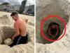 Moment tourist swallowed by quicksand