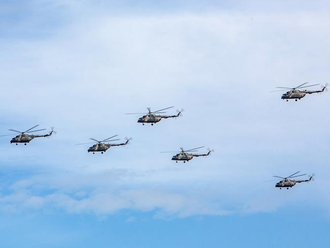 This photo, provided by Russian Defence Ministry Press Service, shows military helicopters flying, in the Chita region, Eastern Siberia, on Tuesday.