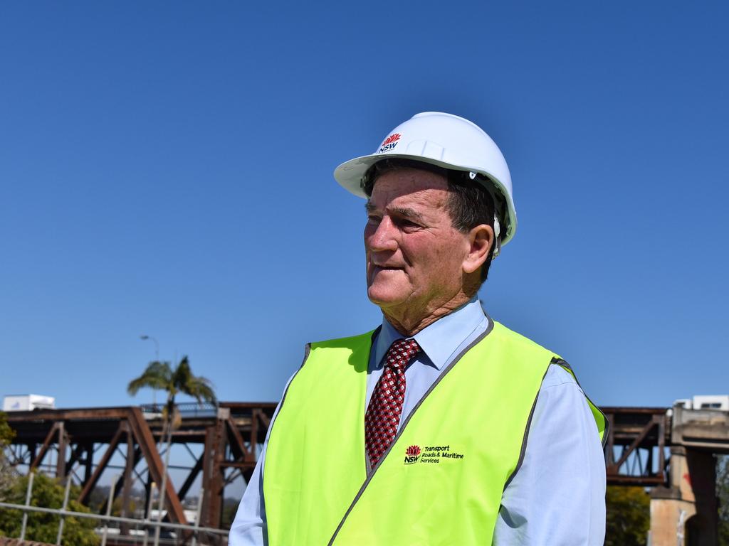 Clarence Valley Council mayor Jim Simmons in quiet reflection. The final segment of the new Grafton bridge has been lifted into place signalling the final stages of its construction.