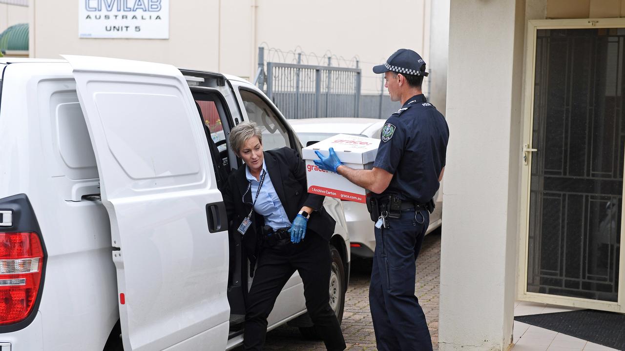 SA Police officers seize evidence from the ongoing Annie Smith investigation at Integrity Care's office in Edwardstown. Picture: Tom Huntley.