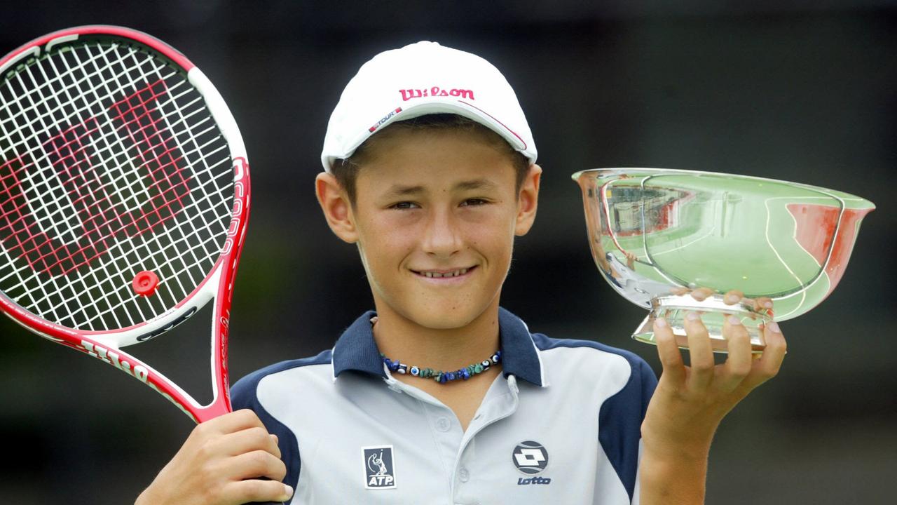 A young Bernard Tomic after winning a tournament.