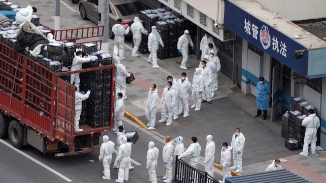 Just getting daily food supplies and necessities to local residents in Shanghai is currently difficult, where 26 million people are in lockdown. Picture: AFP / China OUT