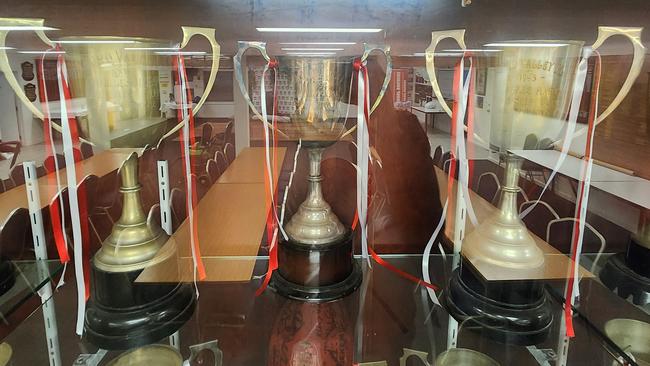 Lalor's 1991, 1992, 1993 premiership cups.