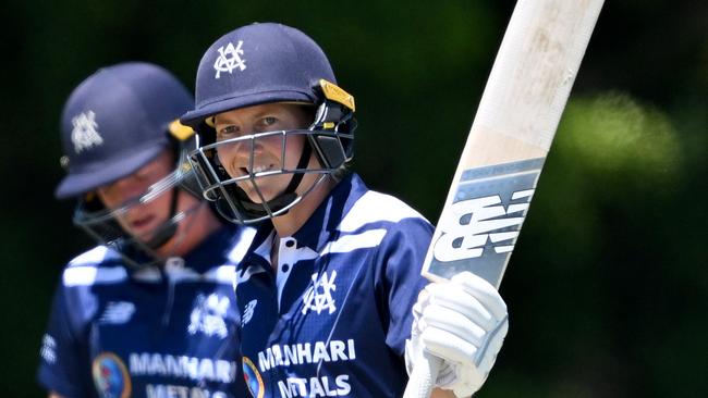 BRISBANE, AUSTRALIA - OCTOBER 12: Meg Lanning of Victoria celebrates after scoring a half century during the WNCL match between Queensland and Victoria at Peter Burge Oval, on October 12, 2023, in Brisbane, Australia. (Photo by Bradley Kanaris/Getty Images)