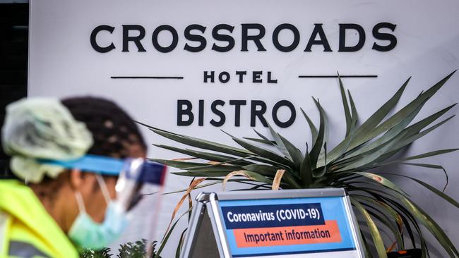 Medical staff at a pop-up COVID-19 testing clinic at Casula’s Crossroads Hotel car park. Picture: David Gray/Getty Images