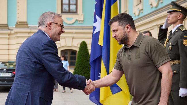 Committed partners? Australian PM Anthony Albanese and Ukrainian President Volodymyr Zelensky shake hands at Kyiv in July last year. Picture: AFP