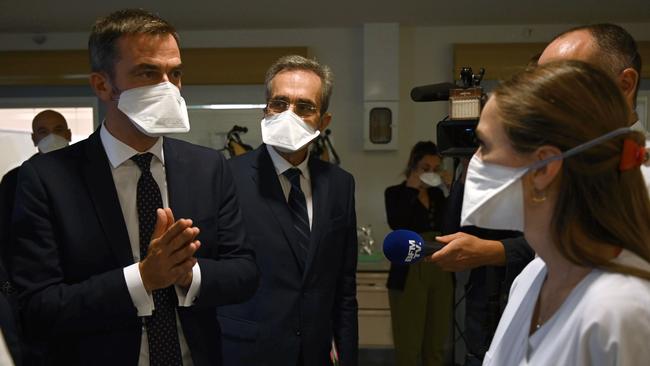 French Health Minister Olivier Veran (left) speaks with health personnel at the La Timone public hospital in Marseille. Picture: AFP