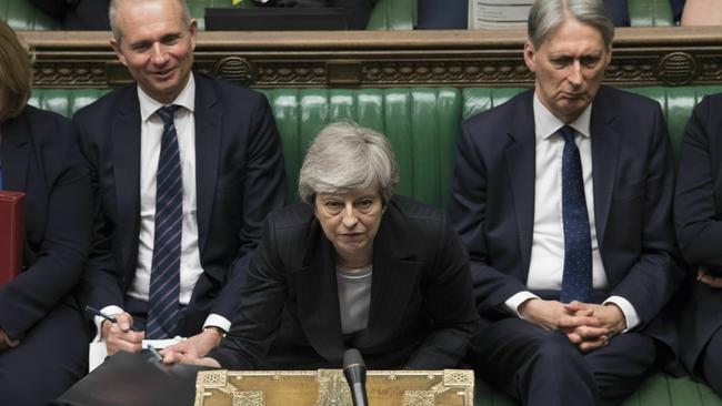 Theresa May continues to fight on in question time in parliament. Picture: AP