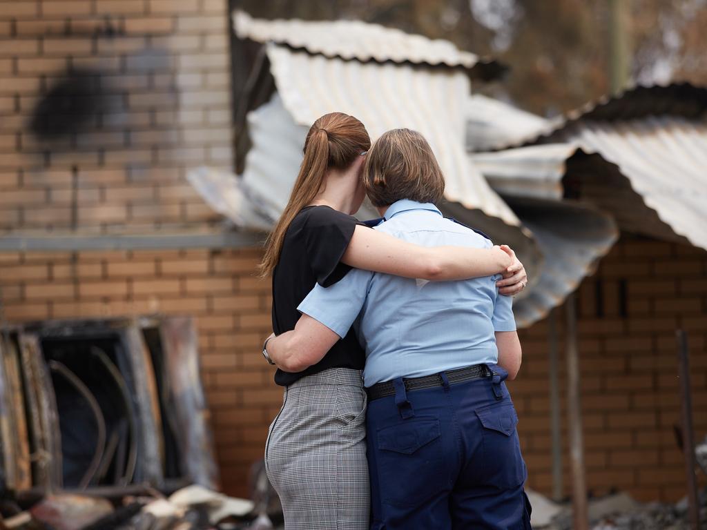 Community strength ... after the fires, Australians are still helping each other to rebuild. Many of their stories feature in Fighting Spirit.