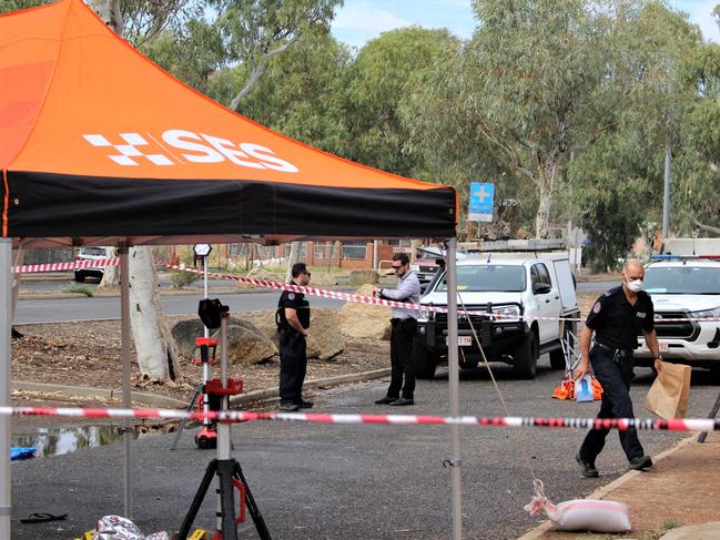 Police on the scene of an alleged aggravated assault on Gap Road in Alice Springs, October 4, 2022. Picture: Jason Walls