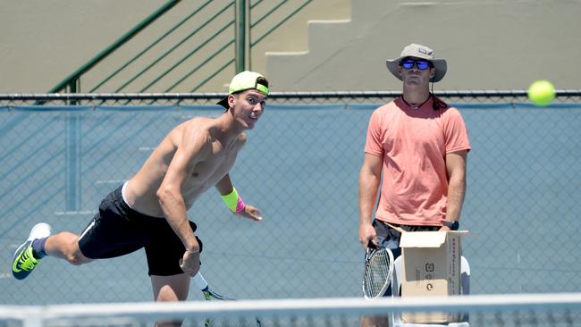 Thanasi Kokkinakis trains under the watchful eye of longtime coach Todd Langman in 2015. Picture: Dave Cronin