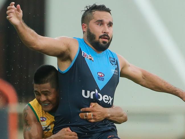 Henry Labadista on Jarrod Stokes as Saint Mary's take on Darwin Buffaloes at TIO Stadium.Picture GLENN CAMPBELL