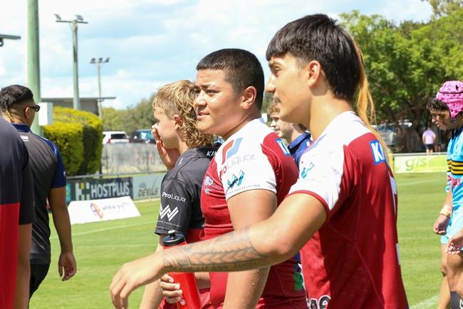 Taufa Taulani (centre) with teammates back in 2023. Photo: Rikki-Lee Arnold/QRL
