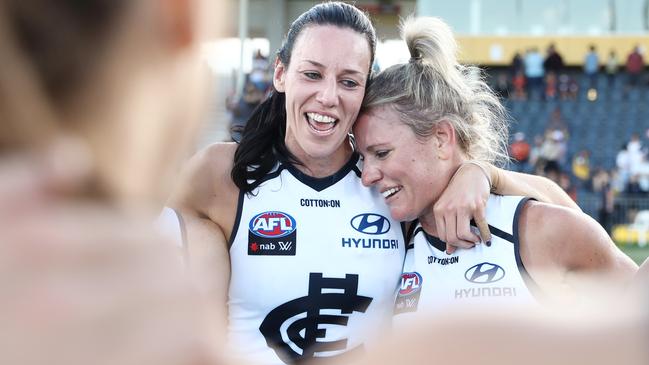 Katie Loynes and Alison Downie after their final AFLW match.