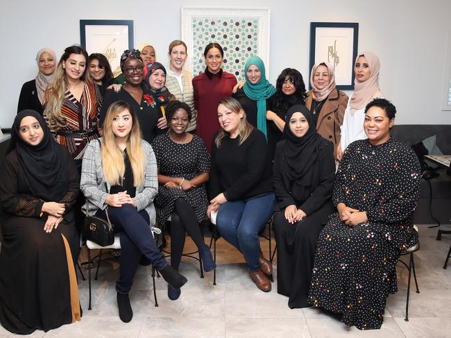 Meghan, Duchess of Sussex and chef Clare Smyth pose for a group photo with members of the Hubb Community Kitchen. Picture: Getty Images