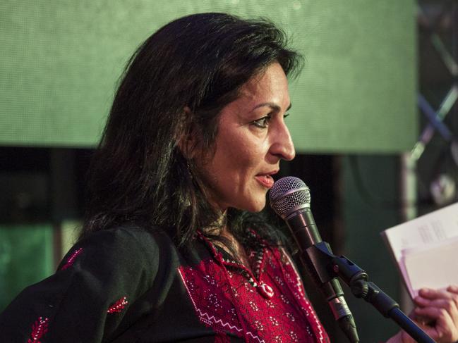 BEIT WAZAN, WEST BANK - JUNE 4:   Susan Abulhawa, a Palestinian-American writer and human rights activist,  speaks at a 2014 Palestine Festival of Literature event at Qasr al Qassem on June 4, 2014 in Beit Wazan, near Nablus, West Bank. The festival is an annual event that aims to bring a cultural festival of international standard to audiences in Palestine to assert "the power of culture over the culture of power."  (Photo by Rob Stothard/Getty Images)