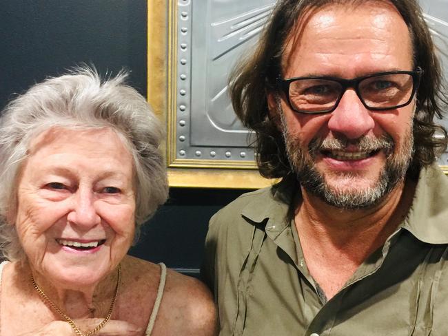 A chain worth $5000 dollars was sewn into a cushion sold at a Southport Op Shop for $4. The chain has been returned to the owner Patty (left) pictured with Op Shop manager Steve Wiggins. 