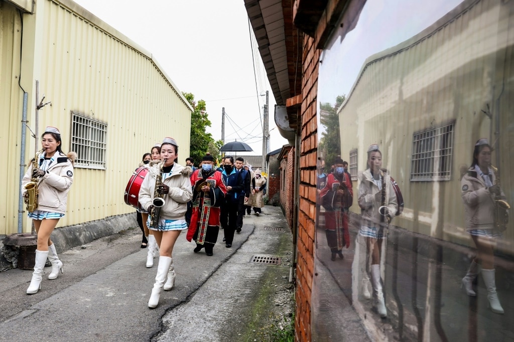 All-women marching band livens up Taiwanese funerals