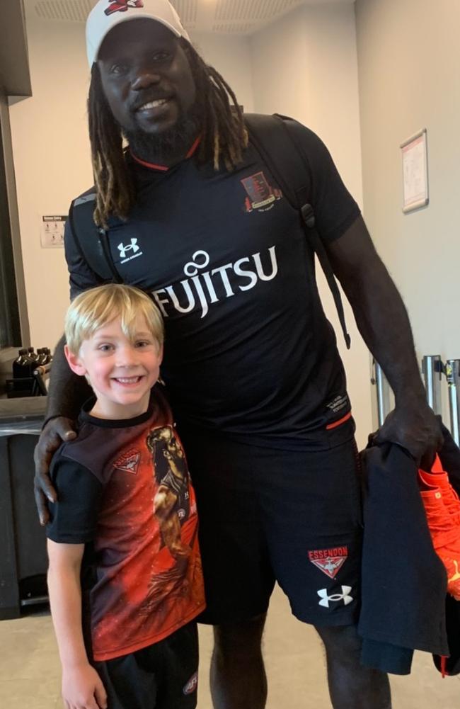 Kevin Sheedy’s grandson Thomas, 6, with Anthony McDonald-Tipungwuti.