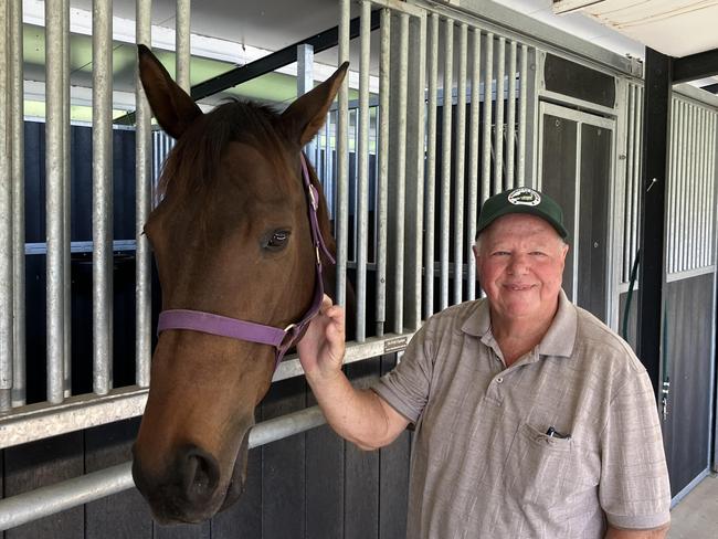 Recovering superstar Alligator Blood with his part owner Jeff Simpson on his property north of Brisbane. Picture: Ben Dorries ,