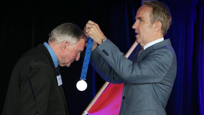 Daily Telegraph editor Christopher Dore presents an award to Elton Winslow. Picture: Toby Zerna