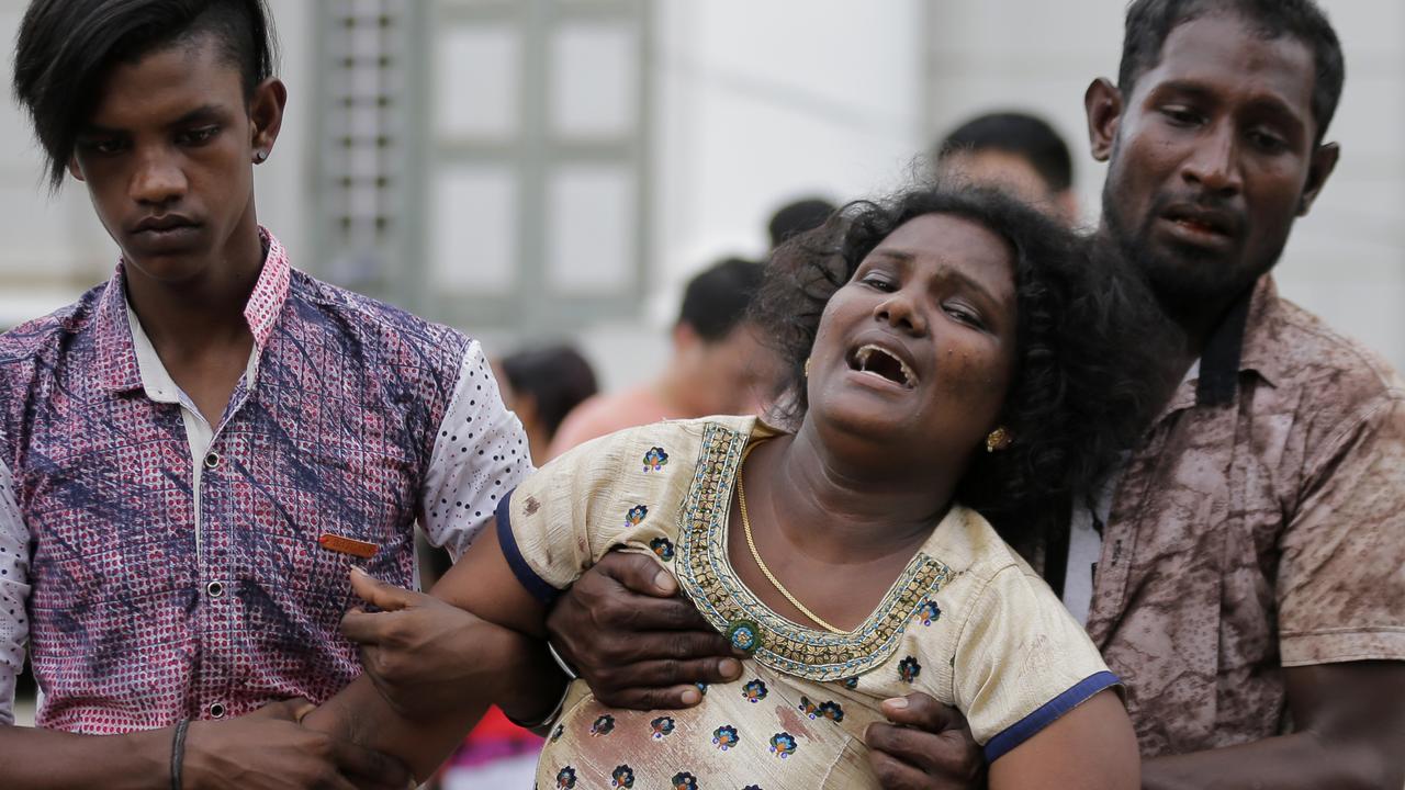Relatives of a blast victim grieve outside a morgue in Colombo, Sri Lanka, Sunday, April 21, 2019. Picture: AP/Eranga Jayawardena.