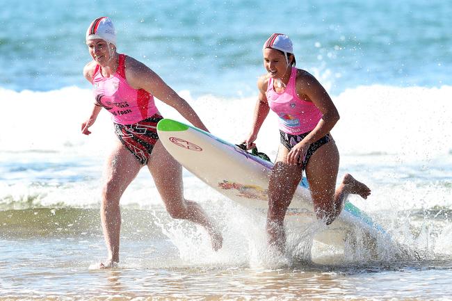 Competitors in the open womens board rescue event. Tasmanian Surf Lifesaving Championships at Clifton Beach. Picture: NIKKI DAVIS-JONES