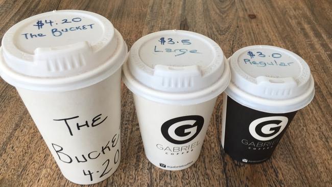 The three sizes of coffee: small, regular and The Bucket. Picture: Jenifer Jagielski