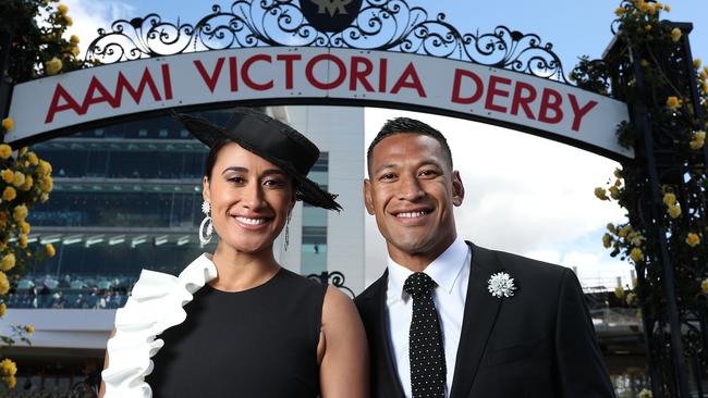 Maria Tutaia and Israel Folau pose on AAMI Victoria Derby Day. Picture: Mark Metcalfe/Getty Images.