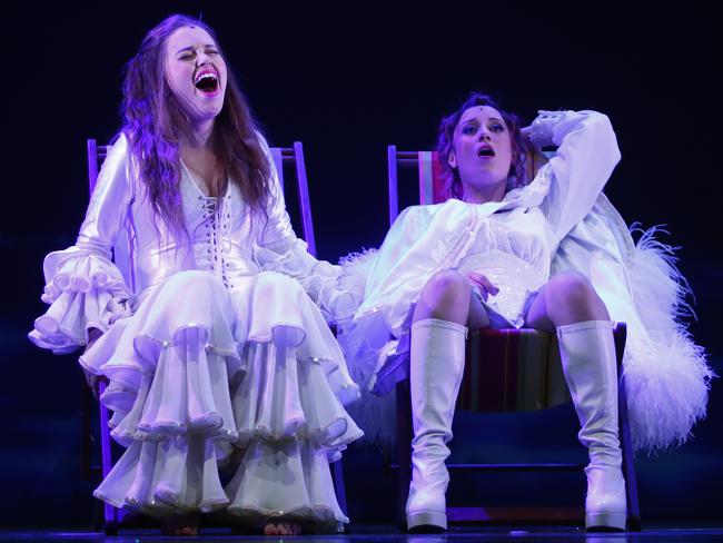 Maggie McKenna (l) as Muriel and Madeleine Jones as Rhonda in Muriel's Wedding The Musical, which got its world premiere in Sydney last year. A return season has already been announced. Picture: AAP Image/Daniel Munoz