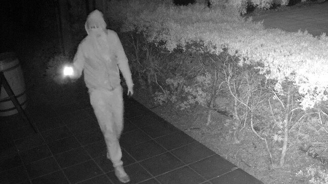 A suspect with a torch cases Emerson’s Restaurant at Lovedale about 6am on March 8. Picture: supplied