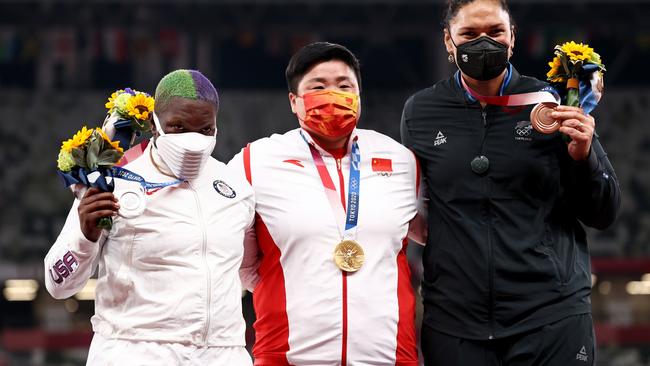 Raven Saunders, Lijiao Gong and Valerie Adams at the medal ceremony for the women's shot put. Picture: Ryan Pierse/Getty Images