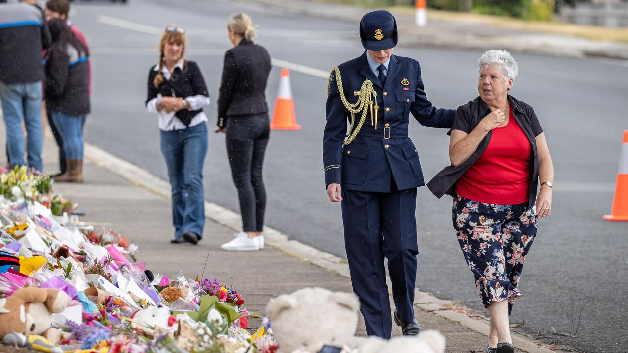 A representative of the Governor as well as the local Devonport Mayor Annette Rockliff pay tribute to the children who died at Hillcrest Primary School. Picture: Jason Edwards