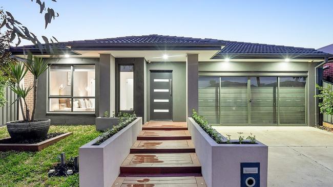 14 Creekbridge St, Craigieburn, had four bidders in the mix — one of them a bit of a joker.